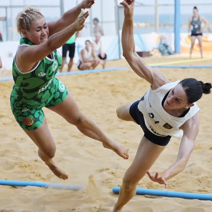 Airborne duel between Omonoia attacker and defender — 2026/27