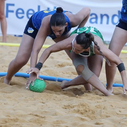 Battle for a loose ball on the sand — 2026/27